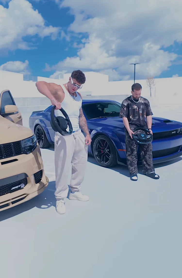 Two customers with custom carbon steering wheels and their Dodge builds